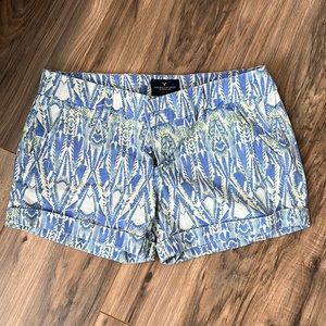 Blue, white, and yellow feathery design. Soft shorts. American Eagle